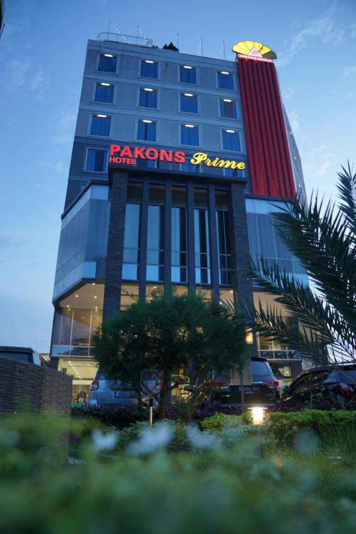 a building with a sign on the side of it at Pakons Prime Hotel in Tangerang