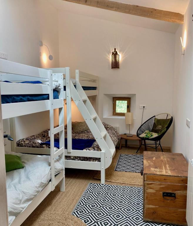 Postel nebo postele na pokoji v ubytování Molinot Gîtes Nature & Confort
