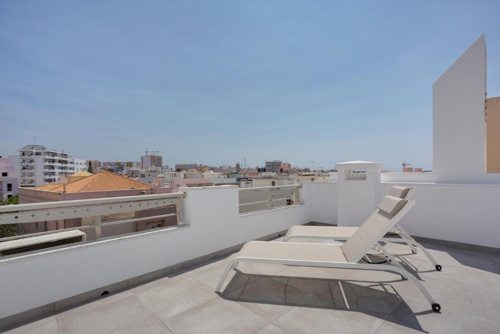 Balkón nebo terasa v ubytování Hotel Made inn Faro