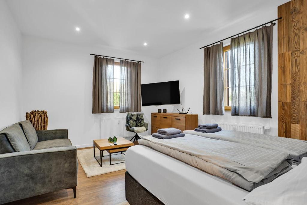 Postel nebo postele na pokoji v ubytování Apartmány Ochsendorf - Pod Strání