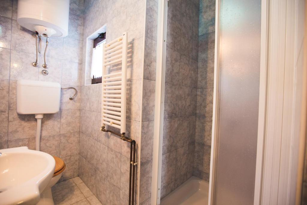 Ванная комната в Apartmani Nada & Darko, Kampor, Rab, Hrvatska