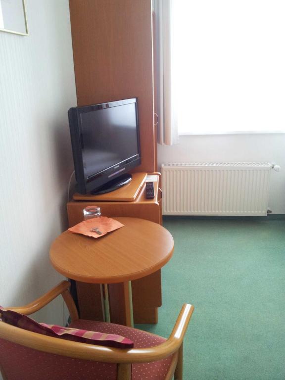 TV a/nebo společenská místnost v ubytování Pension Radke