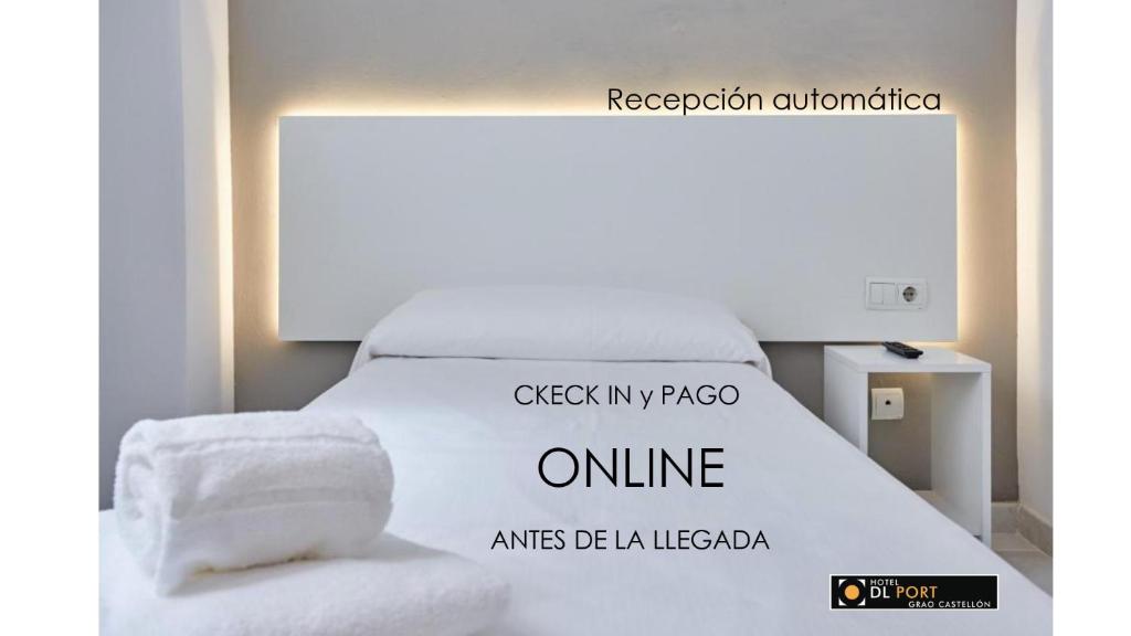 Postel nebo postele na pokoji v ubytování Hotel DL Port