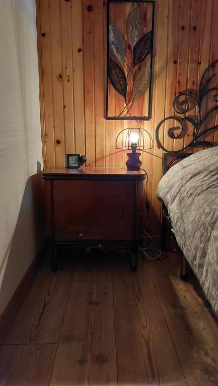 A bed or beds in a room at Appartamento Piano terra - Marmolada - Rocca Pietore - Boscoverde