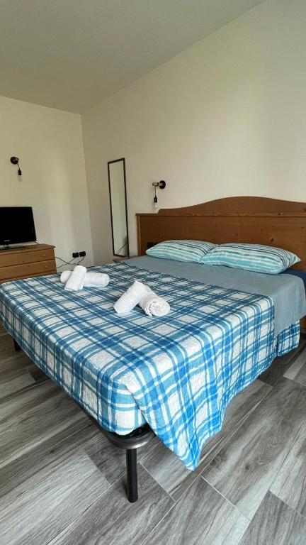 A bed or beds in a room at Agritur Lavanda