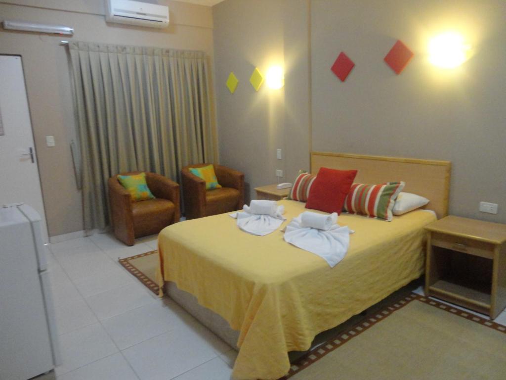 Postel nebo postele na pokoji v ubytování Arthur Palace Hotel