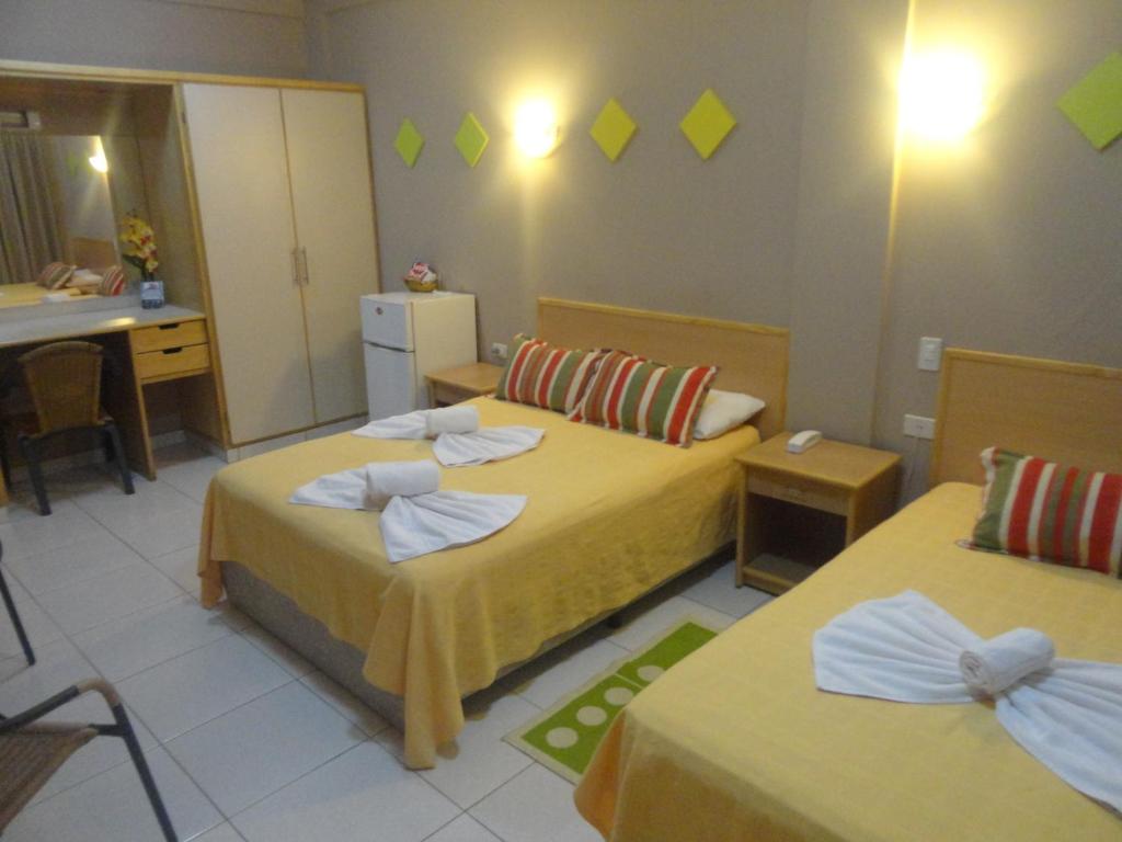 Postel nebo postele na pokoji v ubytování Arthur Palace Hotel