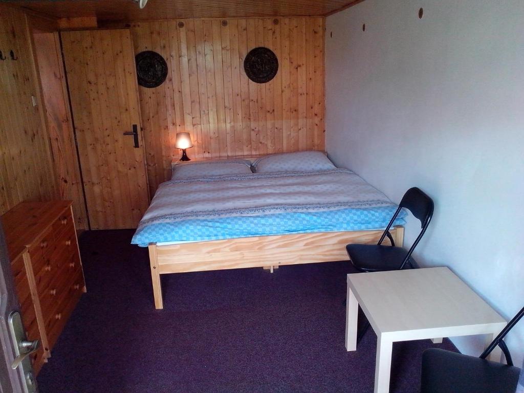 Postel nebo postele na pokoji v ubytování Chalupa Erika