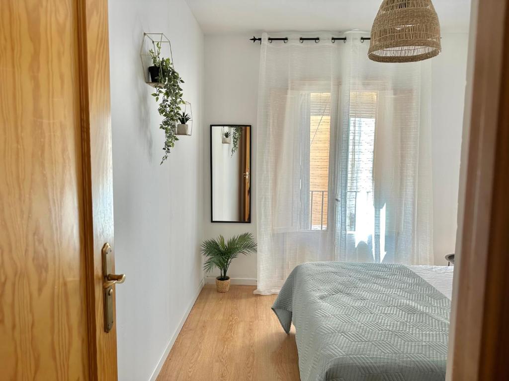 Postel nebo postele na pokoji v ubytování Casa Roman Vega