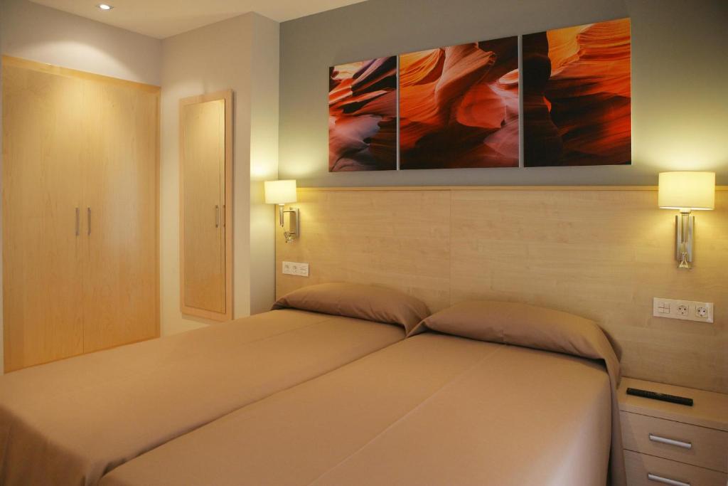 Postel nebo postele na pokoji v ubytování Hotel Acapulco