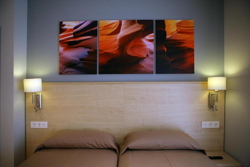 Postel nebo postele na pokoji v ubytování Hotel Acapulco