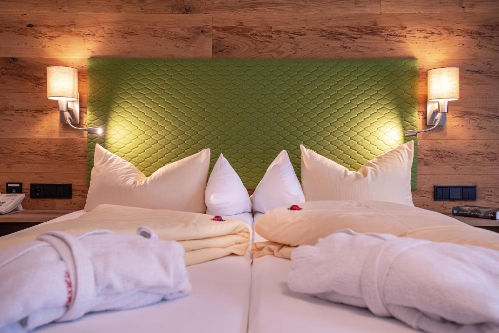 Postel nebo postele na pokoji v ubytování Hotel Glockenstuhl