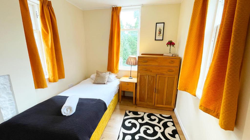 Postel nebo postele na pokoji v ubytování Catcune Family Suite