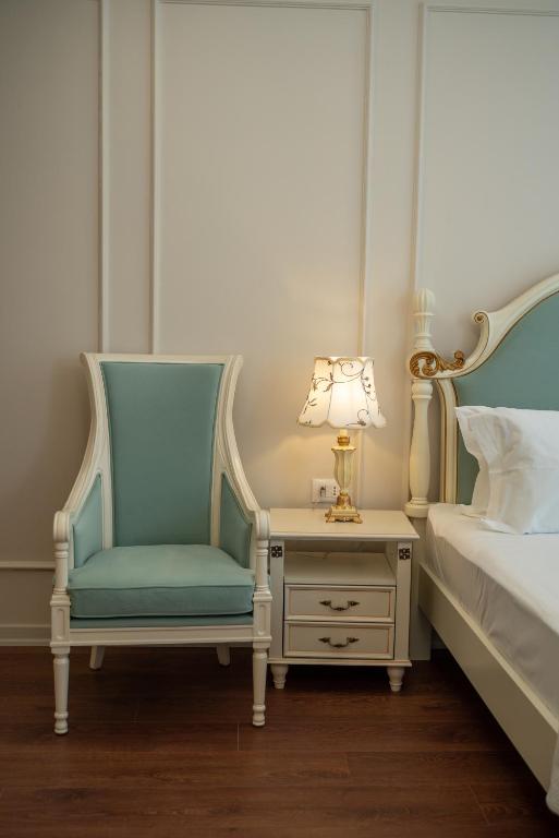 Postel nebo postele na pokoji v ubytování SOL INVICTUS Boutique Hotel Durres Albania