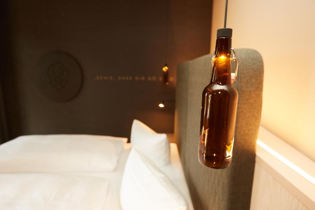 Postel nebo postele na pokoji v ubytování Hotel Zum Goldenen Hirsch
