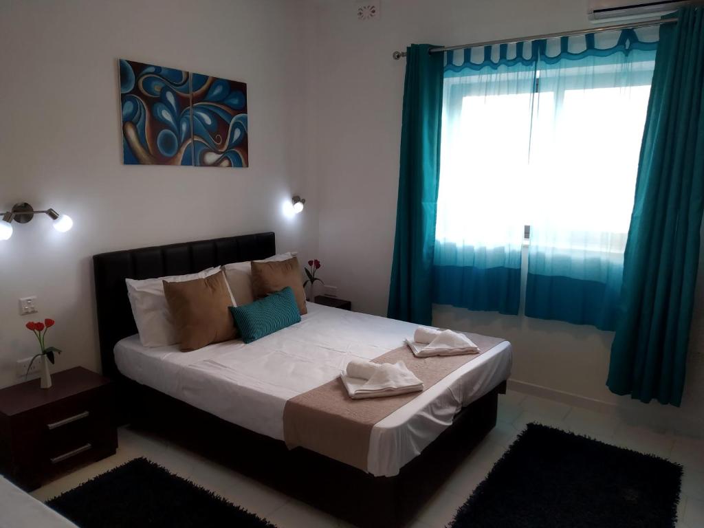 Postel nebo postele na pokoji v ubytování Villa Naxxar Malta