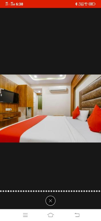 Postel nebo postele na pokoji v ubytování HOTEL SAFARI INN