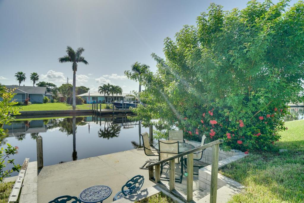 a view of a body of water with a tree at Waterfront Cape Coral Home Dock and Screened Porch in Cape Coral