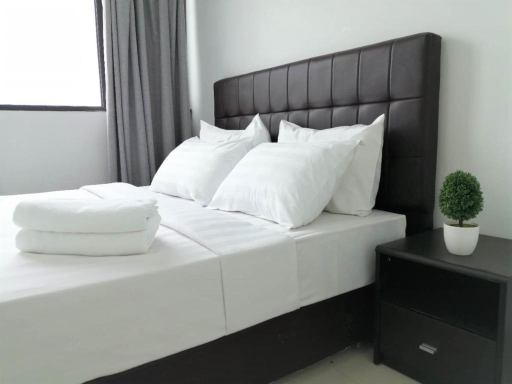 Ліжко або ліжка в номері ImPian 2BR homestay