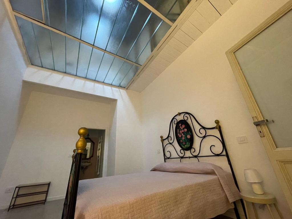 Postel nebo postele na pokoji v ubytování Appartamento in Piazza Spolethome