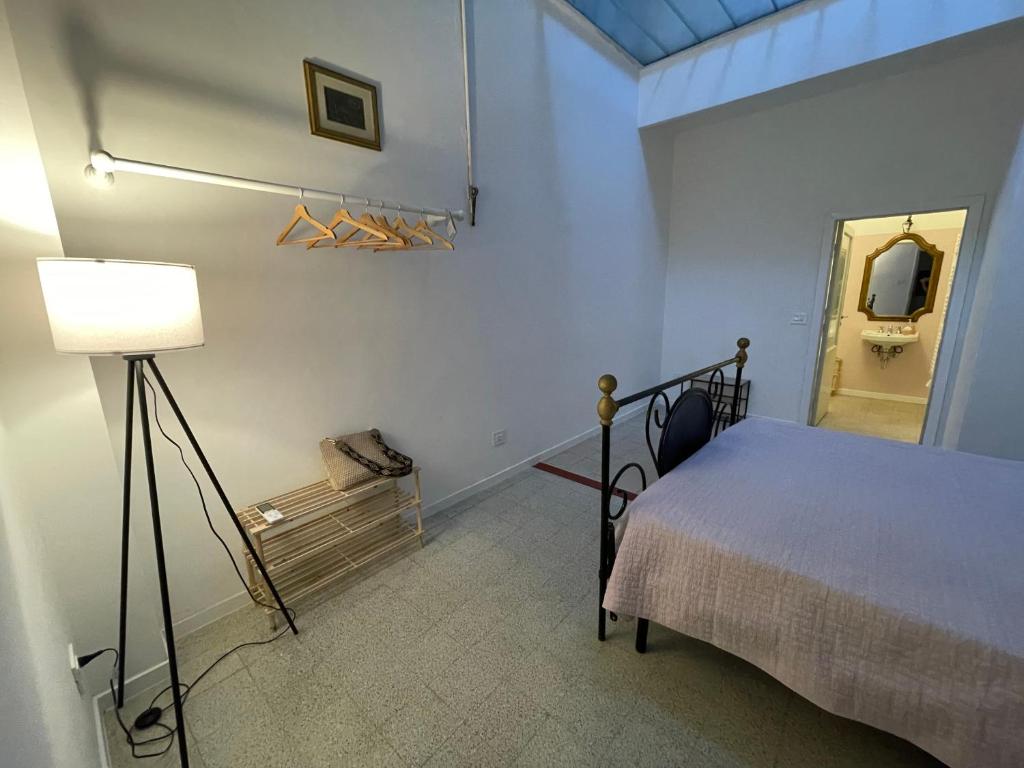 Postel nebo postele na pokoji v ubytování Appartamento in Piazza Spolethome