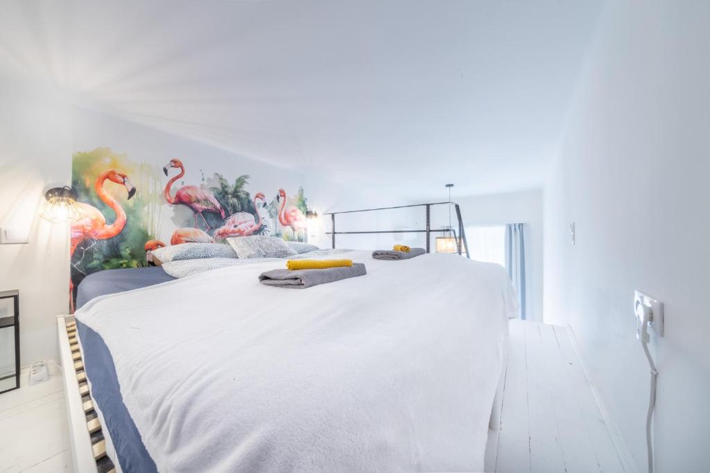 A bed or beds in a room at Souper Apartments Downtown-Király Street