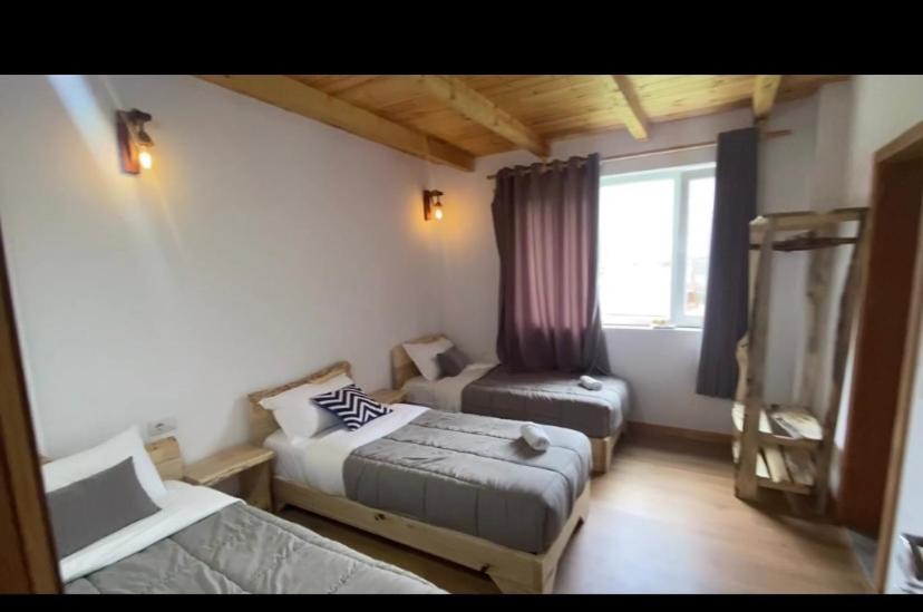 Postel nebo postele na pokoji v ubytování Guesthouse Dritan Tethorja