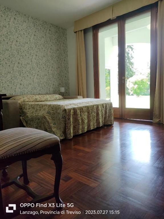 Postel nebo postele na pokoji v ubytování Camera floreale
