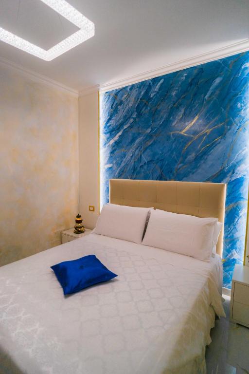 Giường trong phòng chung tại Adriana's Home