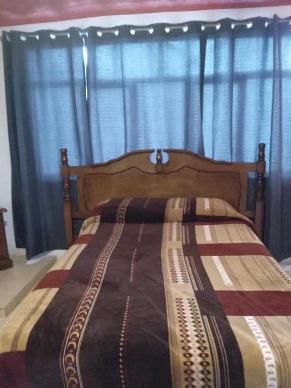 Postel nebo postele na pokoji v ubytování El Hogar de Carmelita