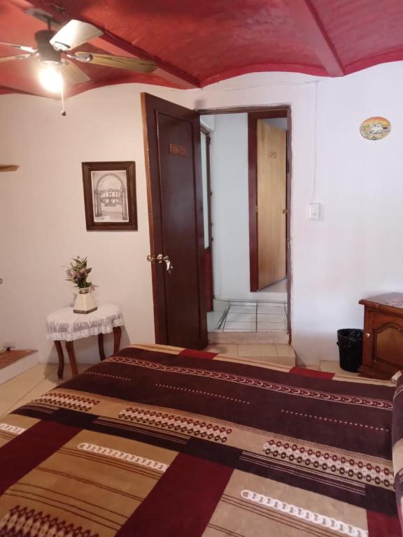 Postel nebo postele na pokoji v ubytování El Hogar de Carmelita