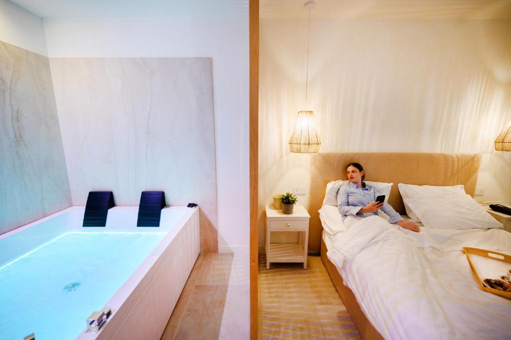 Postel nebo postele na pokoji v ubytování Regiohotel Manfredi