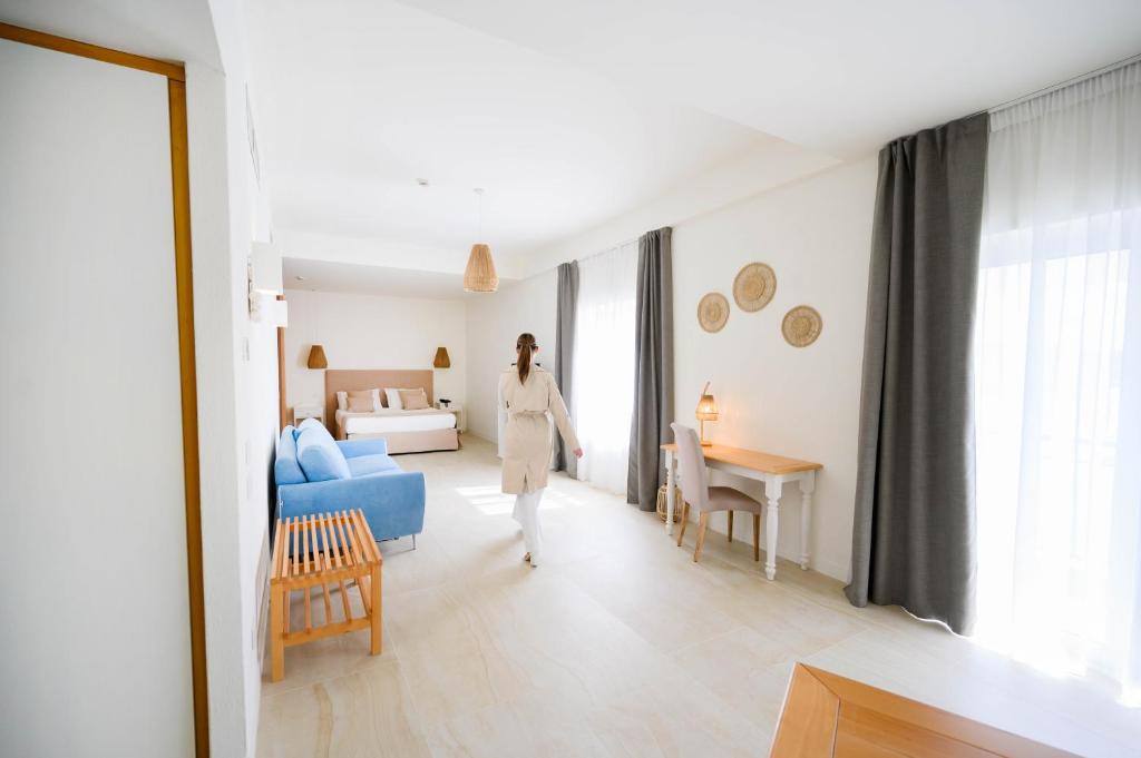 Postel nebo postele na pokoji v ubytování Regiohotel Manfredi