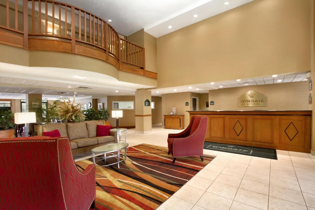 a lobby of a hotel with a waiting room at Wingate by Wyndham - Chattanooga in Chattanooga