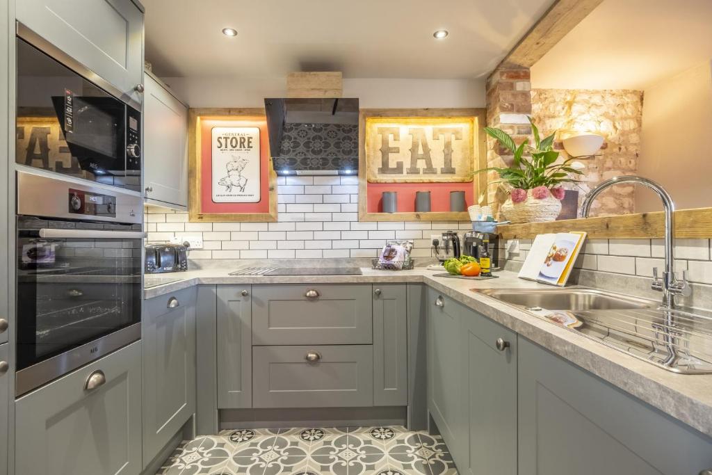 Köök või kööginurk majutusasutuses Cog Cottage