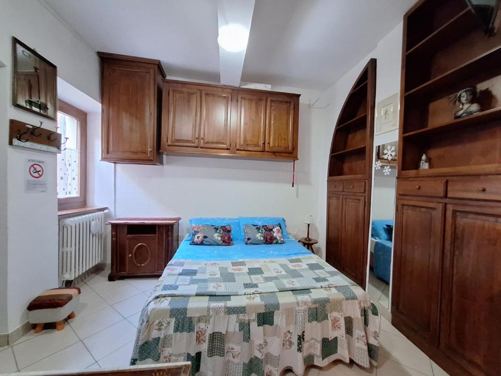 Ένα ή περισσότερα κρεβάτια σε δωμάτιο στο Casa Iris