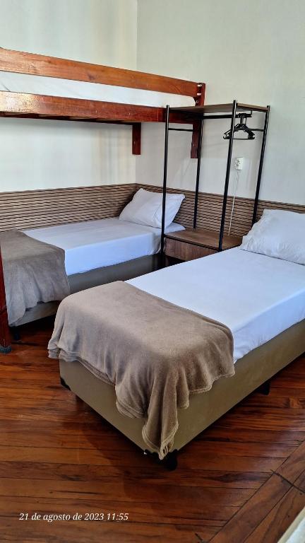 Krevet ili kreveti u jedinici u okviru objekta Hospedagem Camisa 10