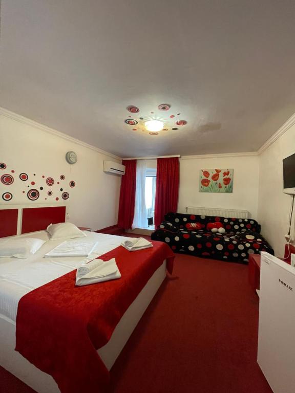 Postel nebo postele na pokoji v ubytování Hotel Prestige