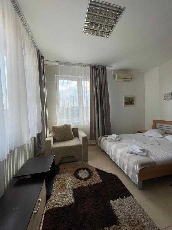 Postel nebo postele na pokoji v ubytování Hotel Prestige