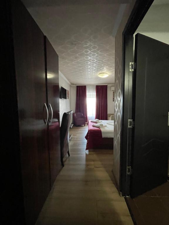 Postel nebo postele na pokoji v ubytování Hotel Prestige