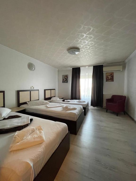 Postel nebo postele na pokoji v ubytování Hotel Prestige