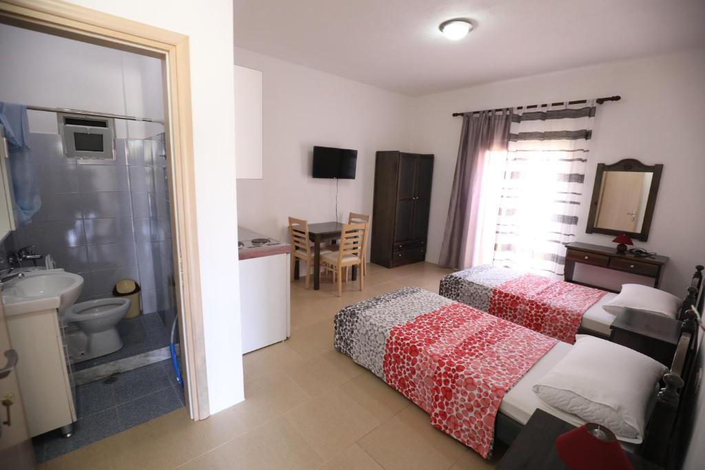 Postel nebo postele na pokoji v ubytování Turka Lake House