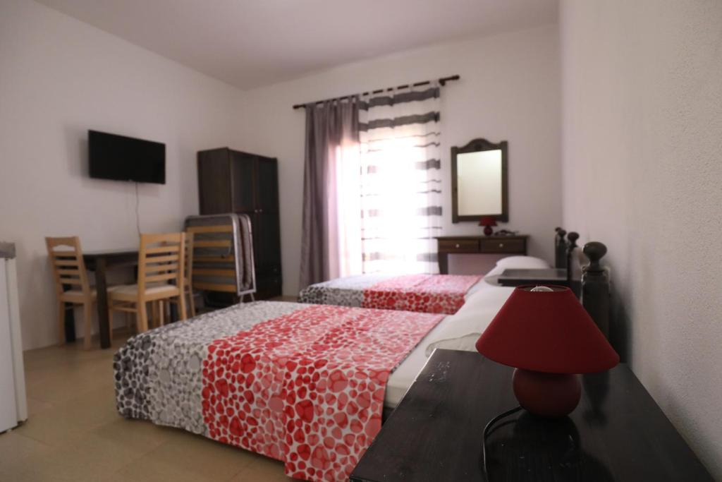 Postel nebo postele na pokoji v ubytování Turka Lake House