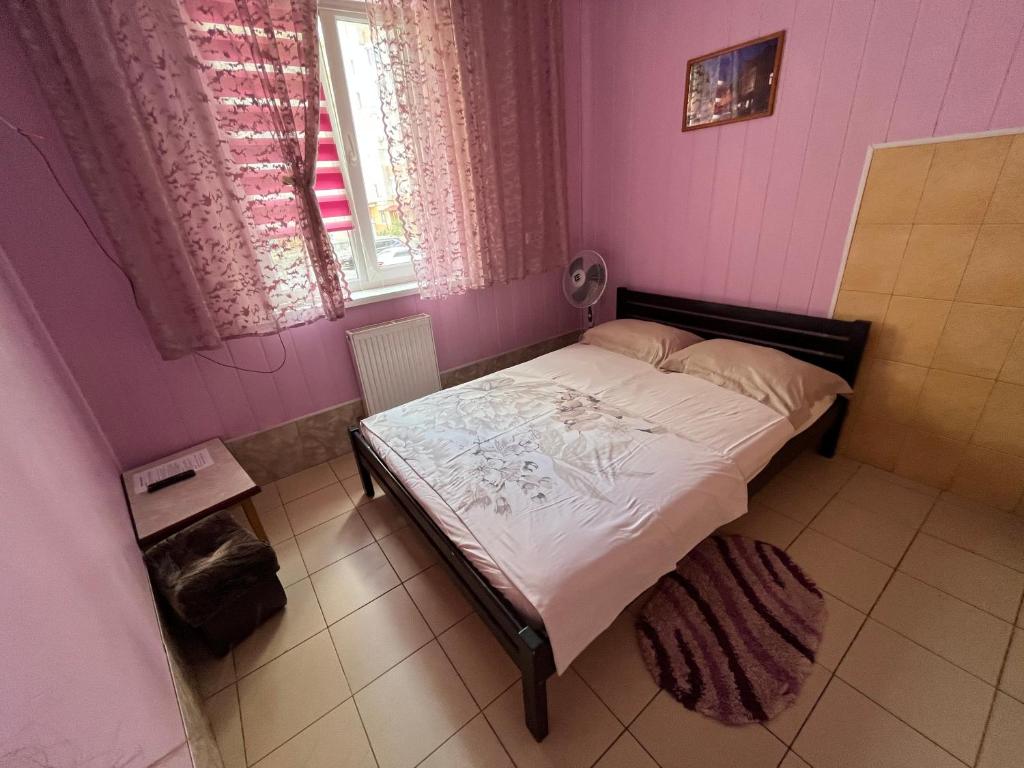 Postel nebo postele na pokoji v ubytování Sun