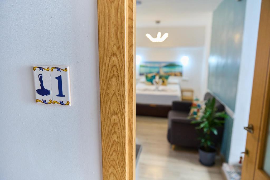 A bed or beds in a room at Casa el "Tablao de las Almendras"