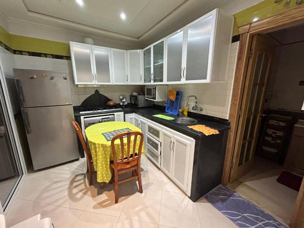 Kuchyň nebo kuchyňský kout v ubytování Inara Appartement