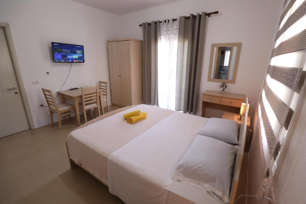 Postel nebo postele na pokoji v ubytování Turka Lake House