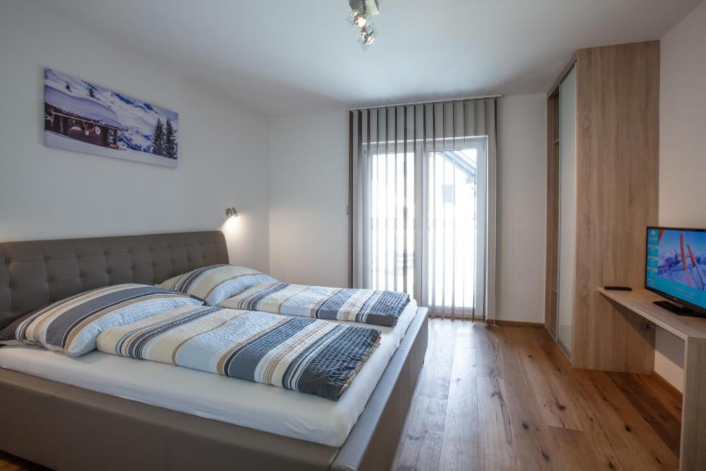 Posteľ alebo postele v izbe v ubytovaní Alpine Appart