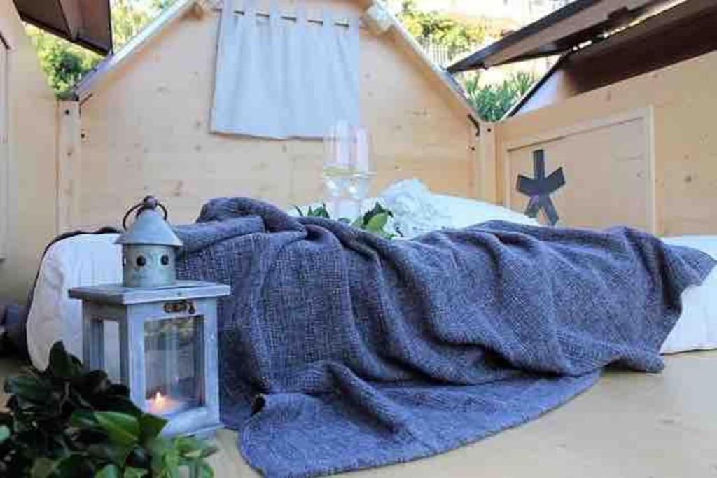 Posezení v ubytování StarsBox jacuzzi privata e piscina vista mare