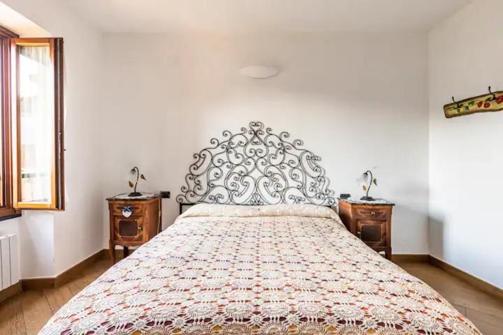 A bed or beds in a room at Bed & Breakfast L'erica